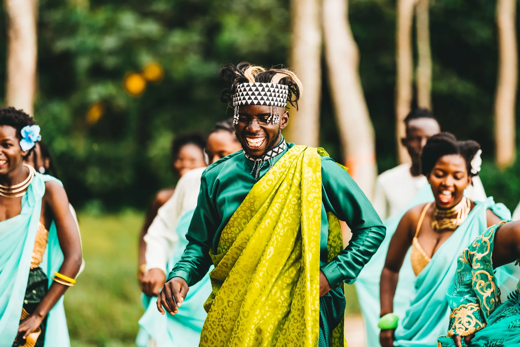 Wedding guests sharing a joyful moment outdoors