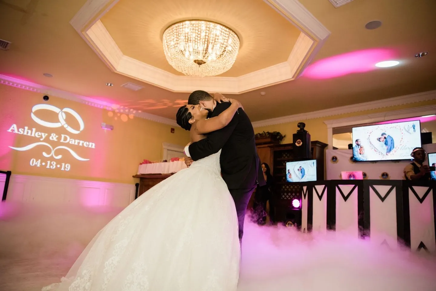 Ashley and Darren share a kiss mid-dance as pink fog rolls across the floor